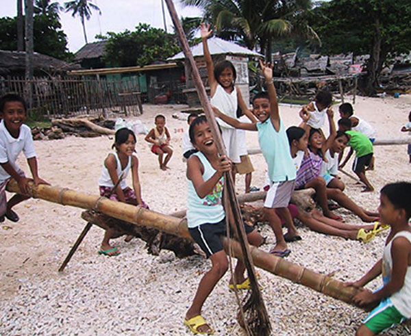 Children playing on Apo Island
